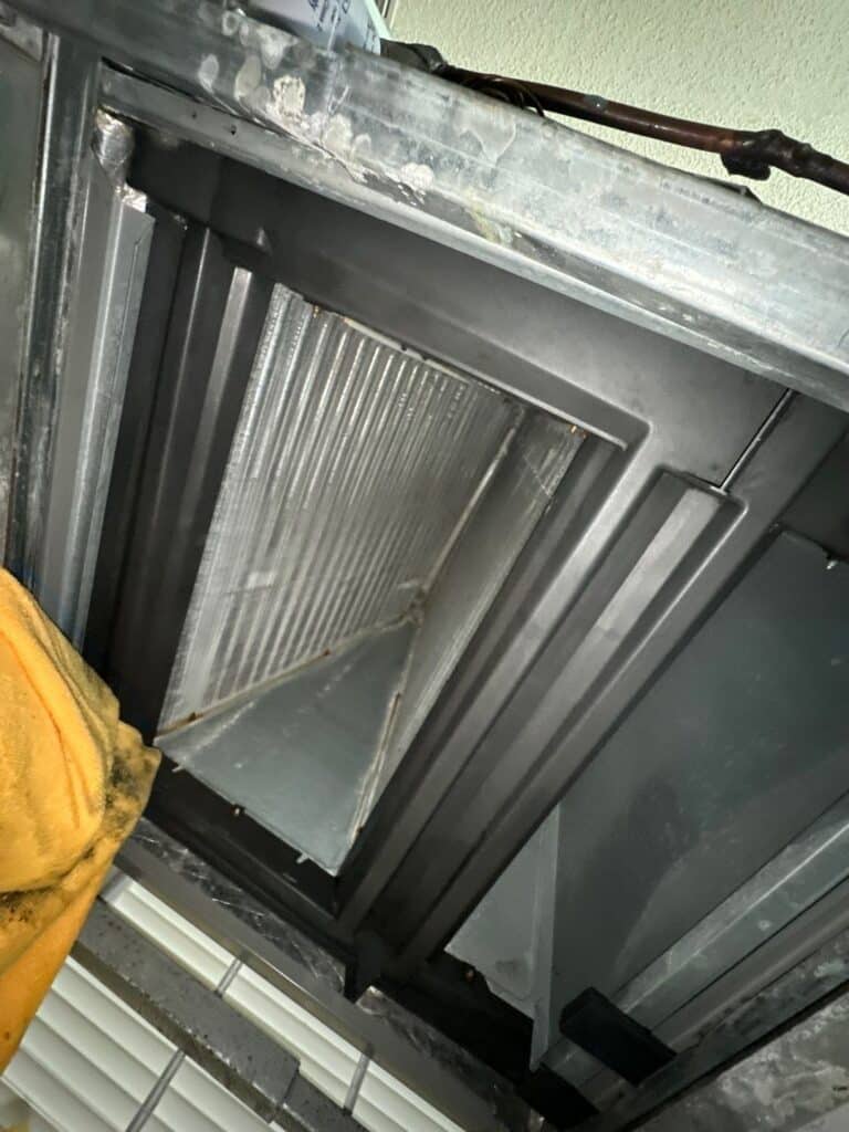 Contaminated insulation removed from inside the air handler