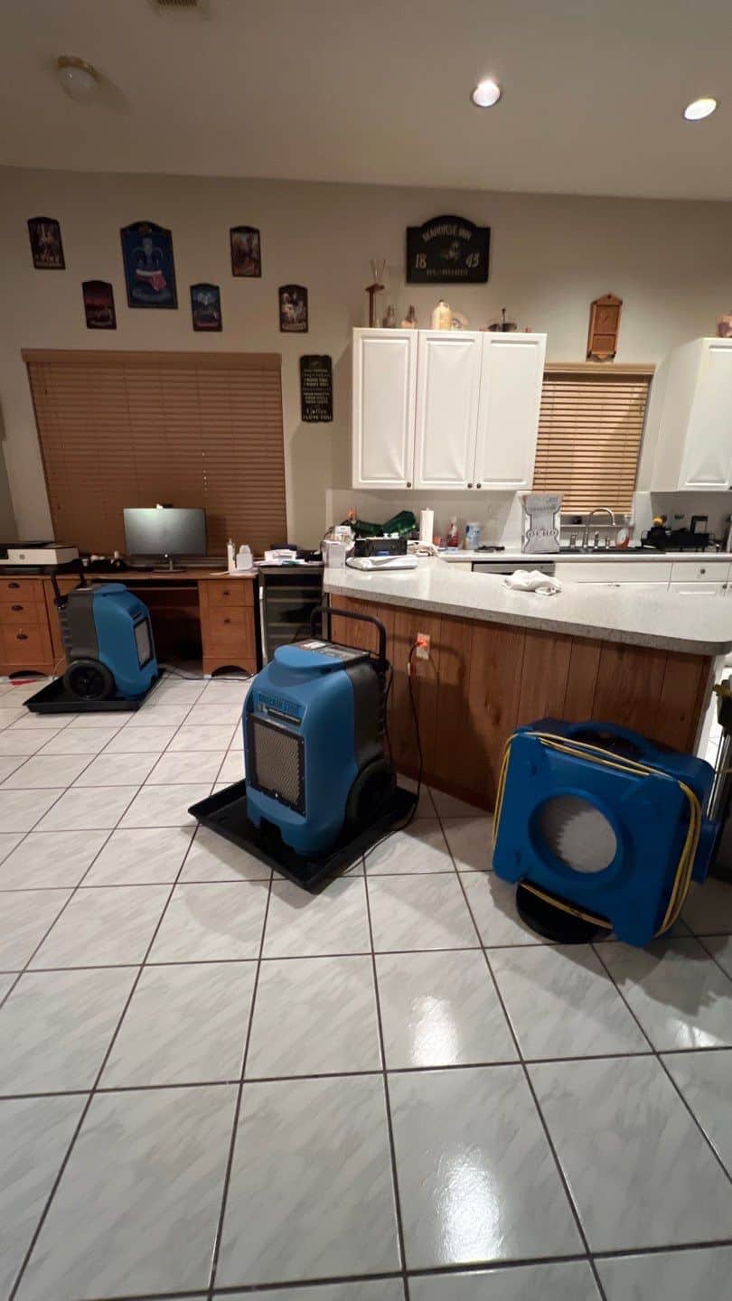 Water damage caused by a ruptured toilet supply line in a Boca Raton home