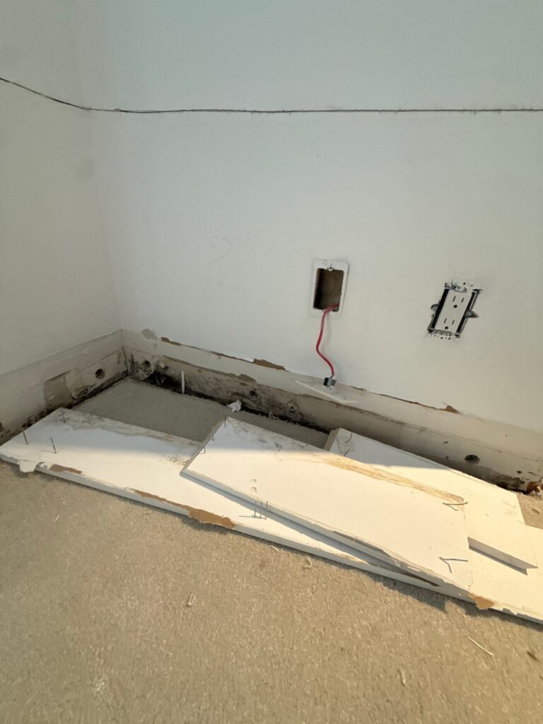 Water damage extending from a kitchen into a bedroom closet