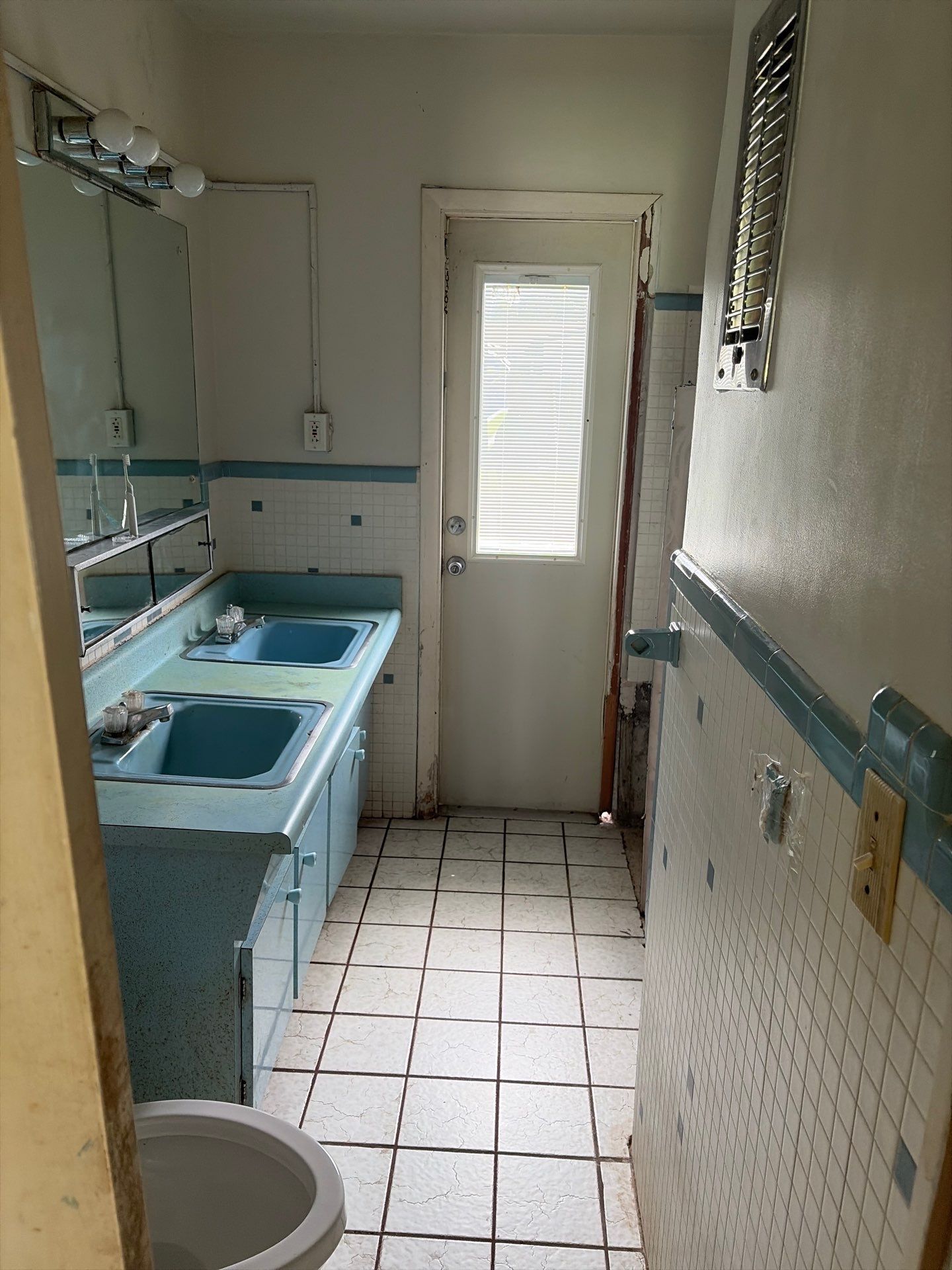 Bathroom after debris removal and biohazard cleanup in West Palm Beach